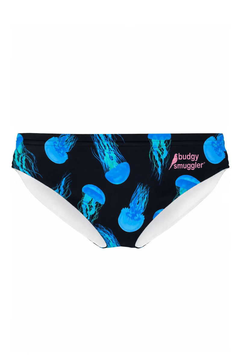 A pair of women's bikini bottoms featuring a black base with a vibrant blue jellyfish pattern and a pink 'buddy smuggler' logo on the right hip, shown against a plain white background.