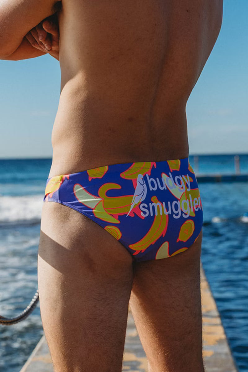 Side view of Drippy Bananas budgies worn by the ocean