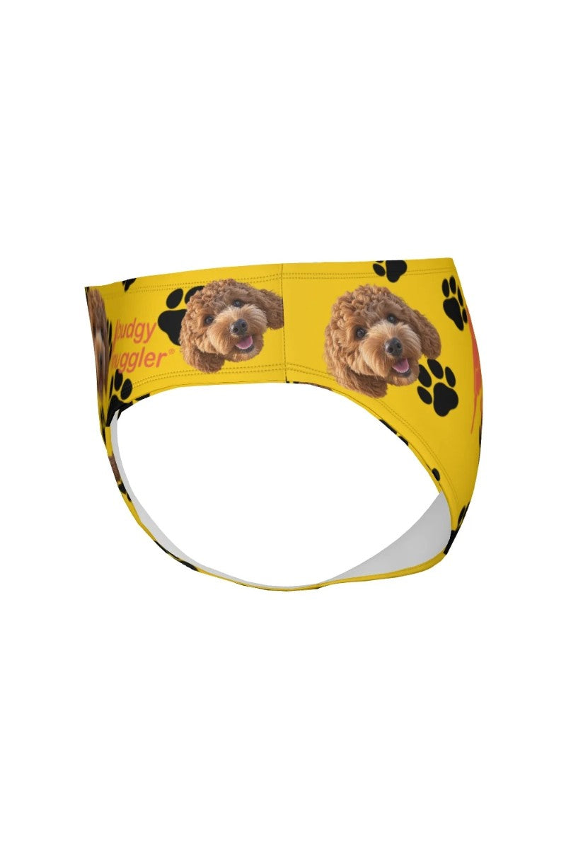 Angled view of custom dog face print smugglers with black paw prints